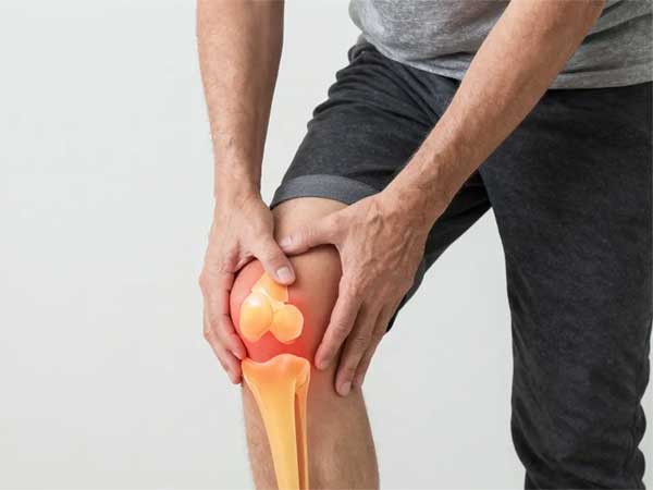 man with knee joint pain