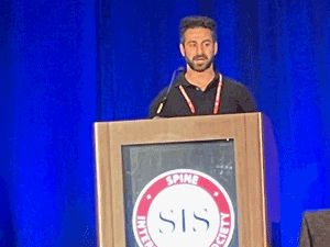 Dr. Farzad Kardvandeian speaking at the Spine Intervention Society's 2021 annual meeting